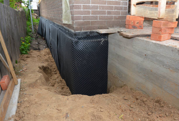 Happy homeowners after waterproofing job in Spring Park